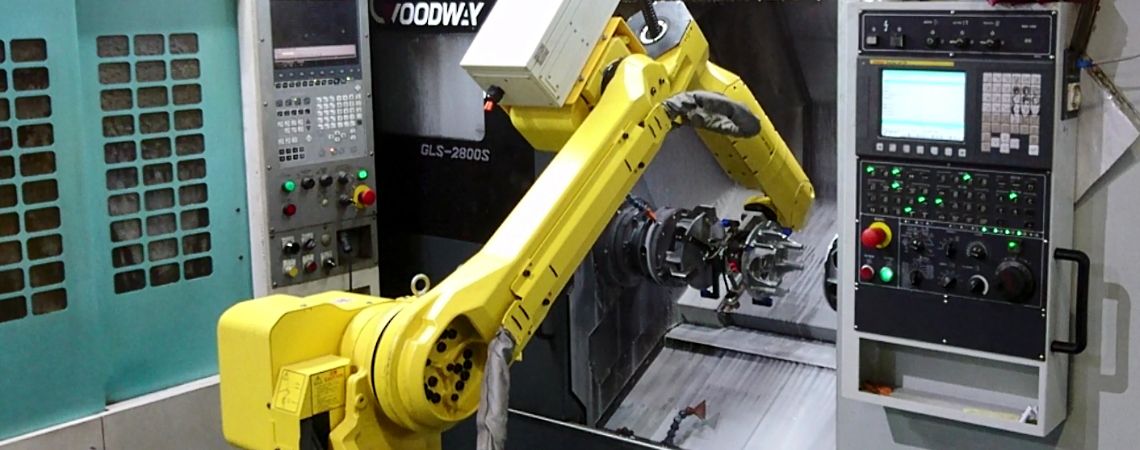 Lathe Machine Tending System Integration - Lathe machine tending with Fanuc M20iA