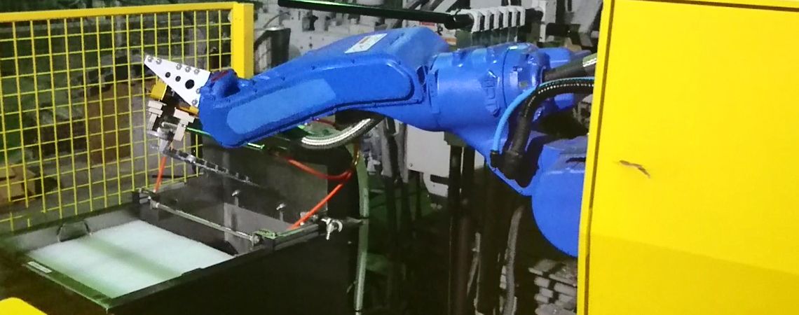 Yaskawa GP25 robotic arm places the casting into the cooling water tank and utilizes an air knife to blow off excess water.